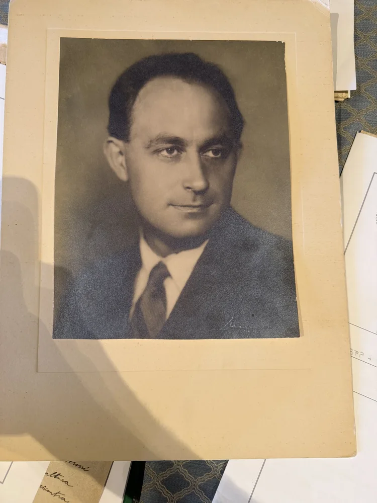 Photograph of a mounted black-and-white portrait of Enrico Fermi