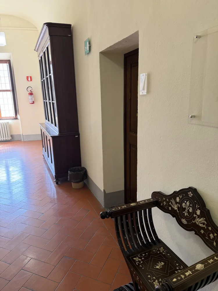 The doorway to Fermi's room inside the Palazzo della Carovana